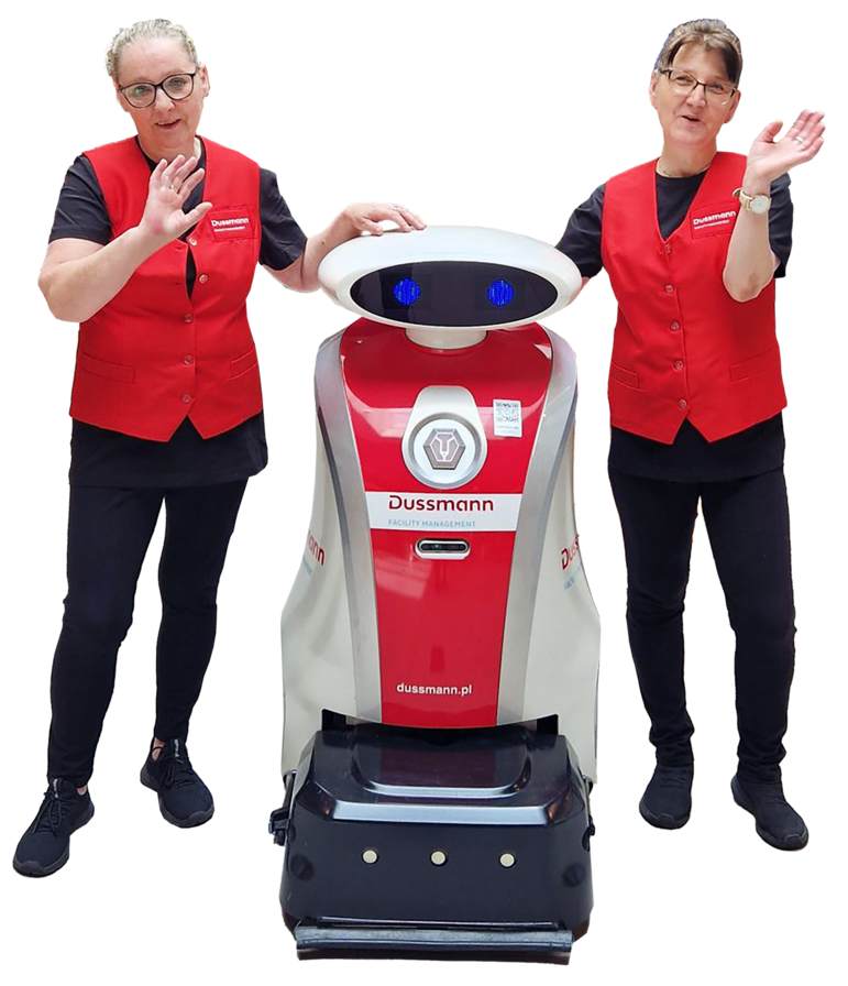 Pracownicy stojący z robotem